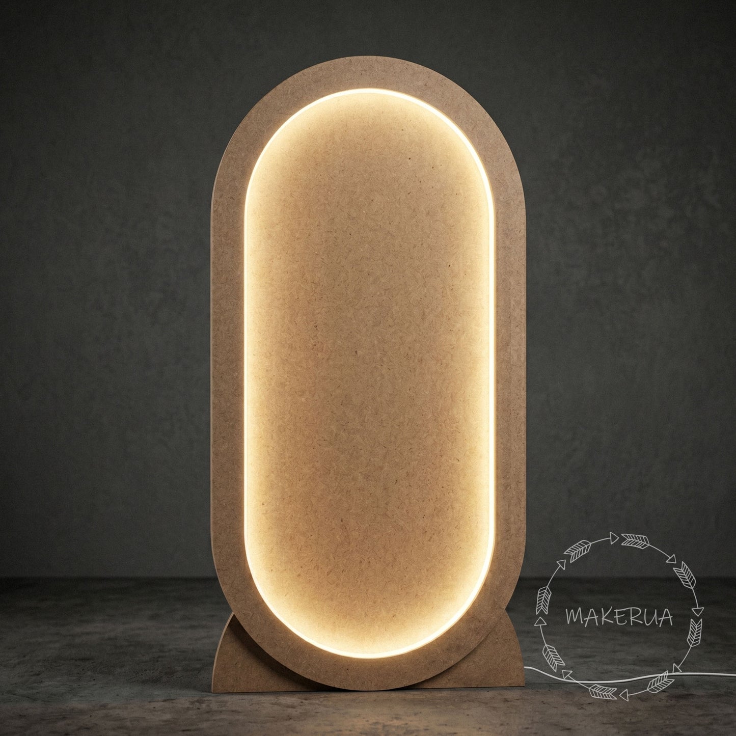 Freestanding oval MDF arch event backdrop with integrated warm LED backlighting, standing on a concrete floor.