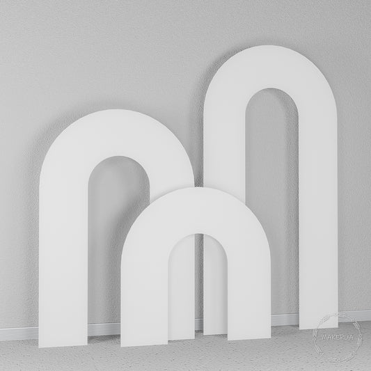 Set of three classic U-shaped white wooden arches. Elegant curved backdrop for weddings, baby showers, and birthday party photo zones.