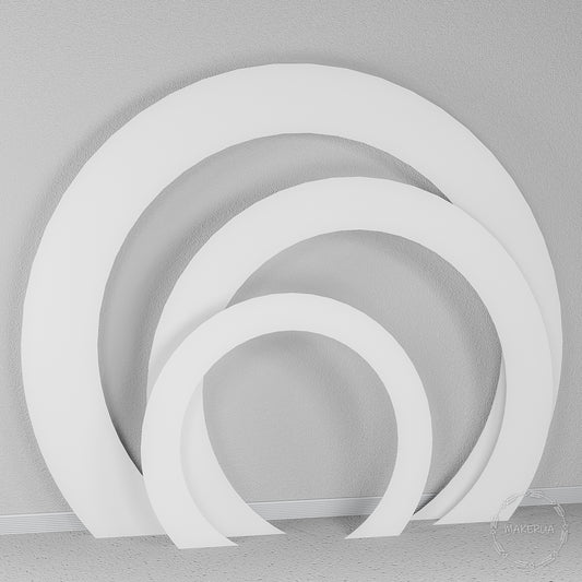 Set of three open white circular arches. Modern round geometric backdrop for elegant wedding ceremonies and contemporary event photo booths.