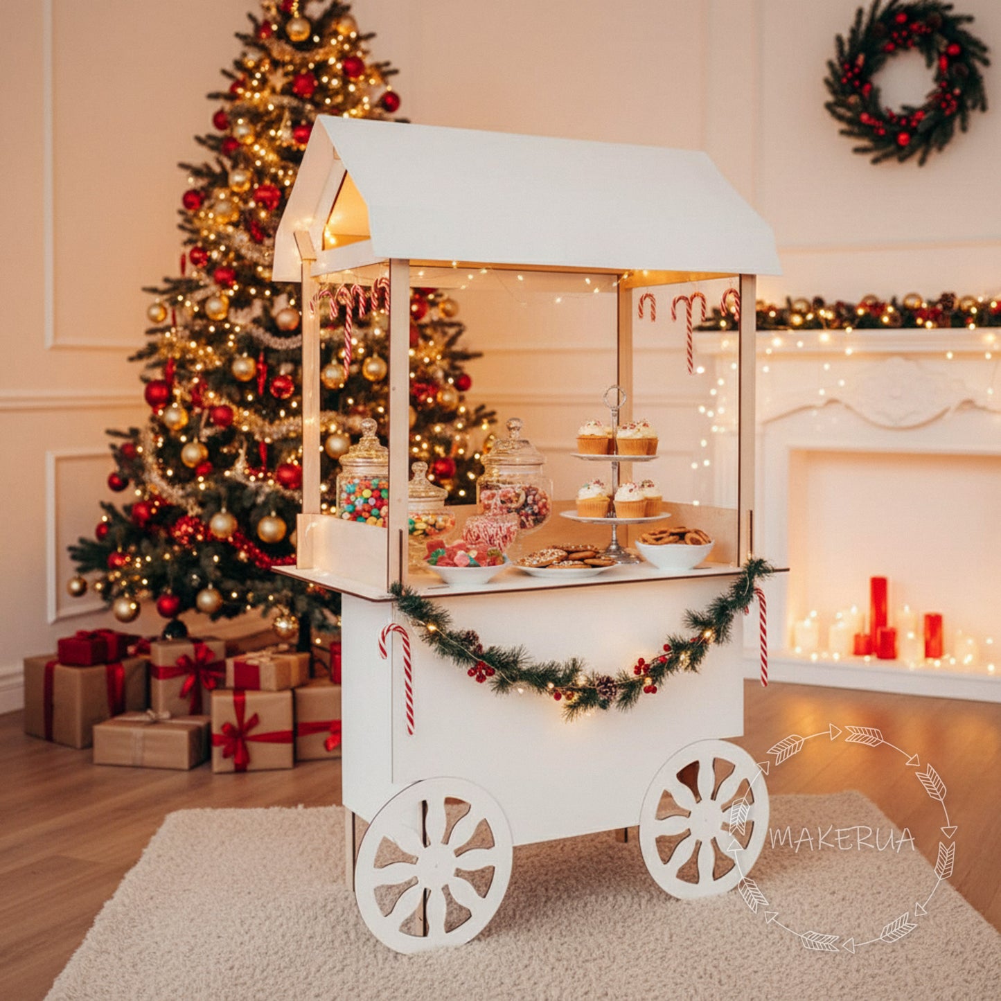 Decorative candy cart with Christmas tree and fireplace in the background