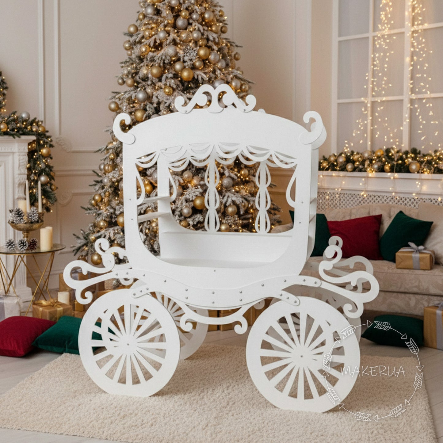 White decorative carriage candy cart table in a festive living room with Christmas tree and lights.